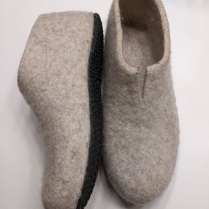 Felted wool booties with a rubber sole.